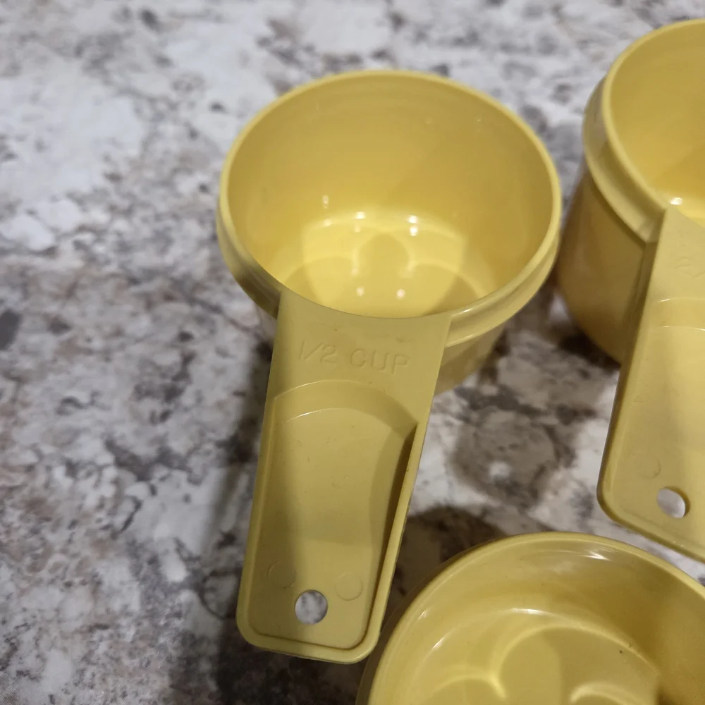 Vintage Tupperware Yellow Measuring Cups Set 1/4c, 1/3c, 1/2c, And 3/4c.